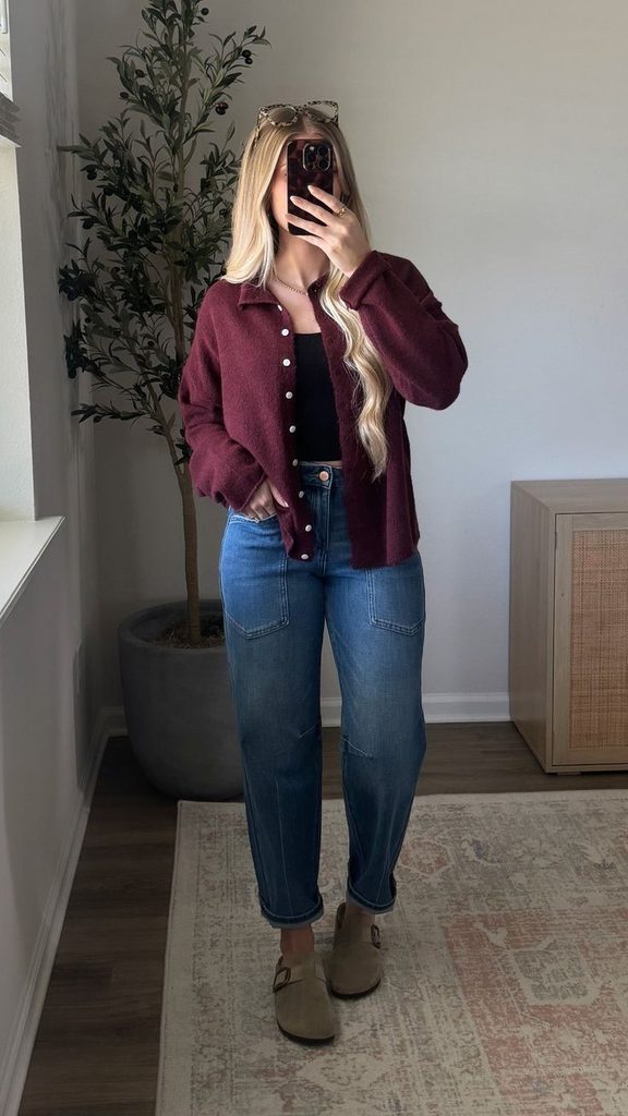 Burgundy overshirt black top and relaxed jeans